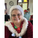 A woman dressed as Mrs. Claus